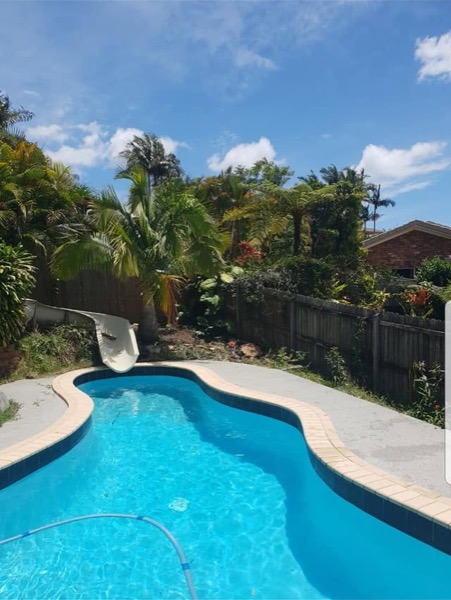 The same pool yard cleaned up after the trim
