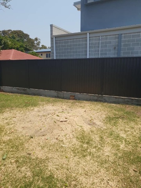 A back lawn left clean and clear after a removal